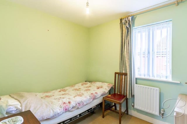 The final bedroom is the smallest of the four, but still a neat and compact space. It faces the front of the property and boasts a carpeted floor and central heating radiator.