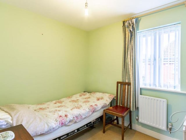 The final bedroom is the smallest of the four, but still a neat and compact space. It faces the front of the property and boasts a carpeted floor and central heating radiator.