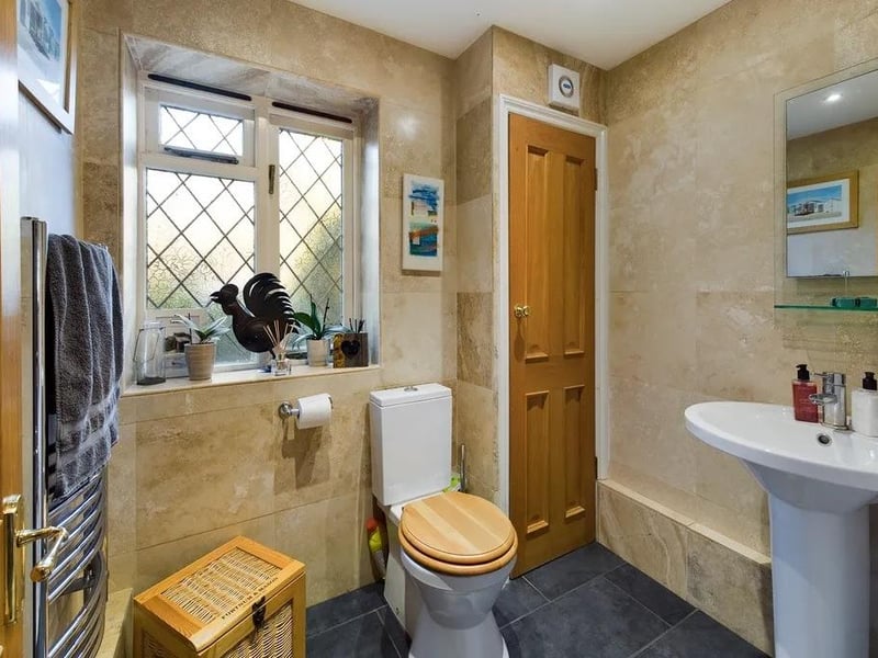 The master bedroom has an en suite shower room and there is another well-appointed shower room on the first floor as well