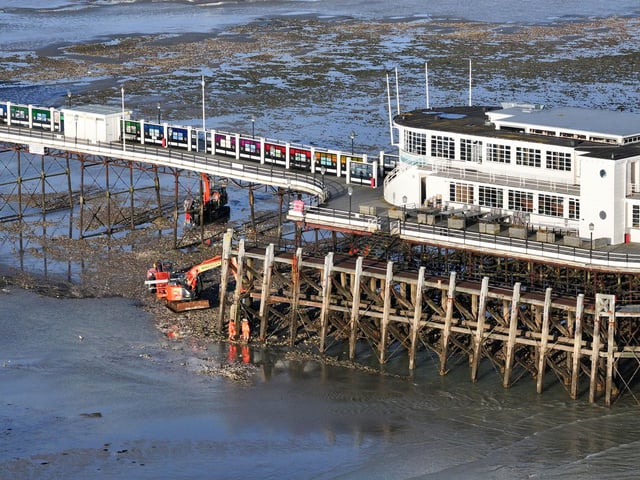 With full repair works unable to start until mid-November, the council is 'having an interim repair done' to help the remaining piles to support the weight of the pier.