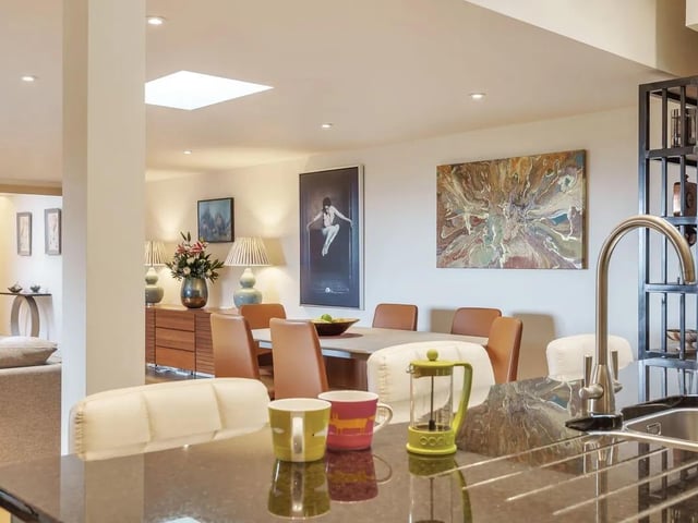 Skylights exaggerate the living room's already impressive sense of scope and space.