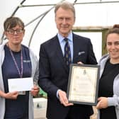 James Whitmore, High Sheriff of West Sussex 2022-23, presents Toni Harris, left, and Emma Biffi with the High Sheriff of West Sussex Award for Arun Youth Projects. Picture: S Robards SR2303302