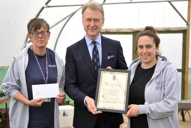 James Whitmore, High Sheriff of West Sussex 2022-23, presents Toni Harris, left, and Emma Biffi with the High Sheriff of West Sussex Award for Arun Youth Projects. Picture: S Robards SR2303302
