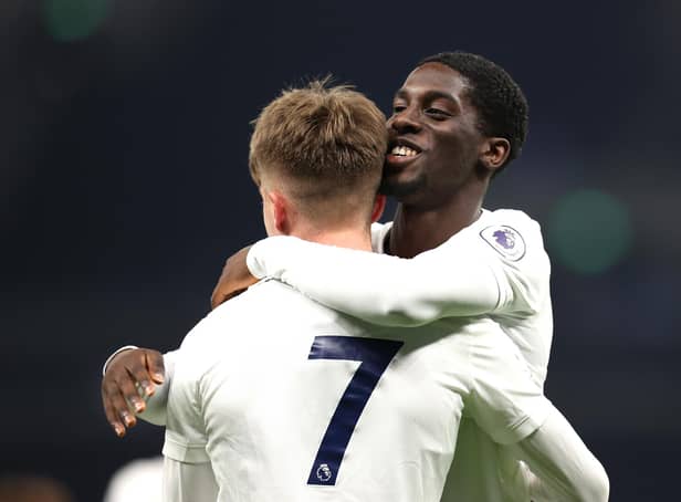 Tobi Omole celebartes with Jack Clarke while at Tottenham. (Photo by Alex Pantling/Getty Images)