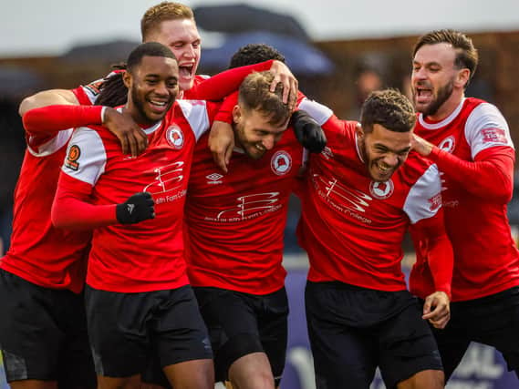 Eastbourne Borough celebrate one of the goals that saw off Cheshunt | Picture: Lydia Redman