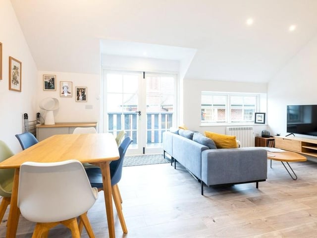 The summer house has a shower room and cloakroom and stairs leading to a mezzanine area