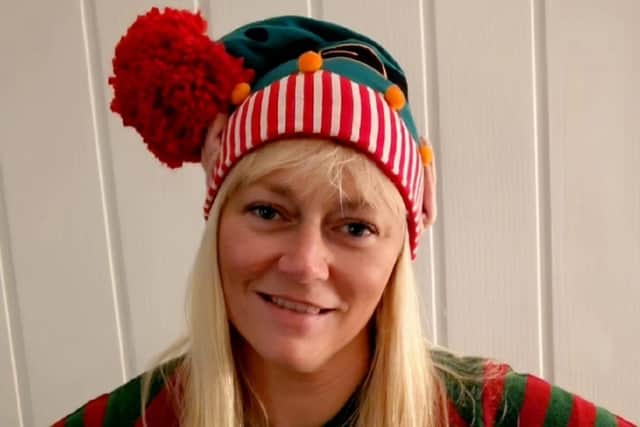 Carrie Howell, community fundraising lead at West Sussex Mind, in her elf hat