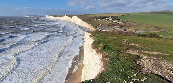 Take a coastal drive from Eastbourne to Beachy Head, the highest chalk sea cliff in Britain. Experience stunning panoramic vistas of the English Channel and the surrounding countryside