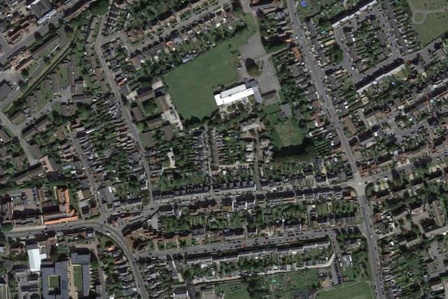 CC/22/01082/FUL: 5 & 6 Russell Street, Chichester. Change of use to a single dwelling. Proposed two-storey rear extension to existing no. 5 and ground floor extensions to rear of both. Demolition of existing front boundary wall and construction of railings and brick piers. Photo: Google Maps.