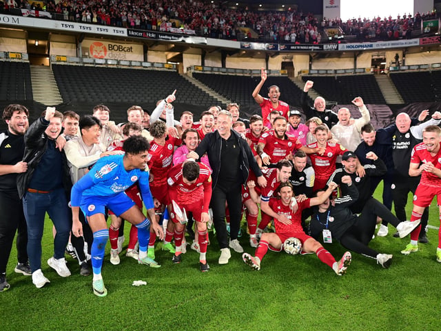 The Crawley Town players and Crawley Town manager Scott Lindsey celebrate victory in front of their supporters during the EFL Sky Bet League 2 play-off second leg match between Milton Keynes Dons and Crawley Town at stadium:mk, Milton Keynes, England on 11 May 2024.:Crawley Town hammered MK Dons 5-1 - and 8-1 on aggregate - to reach the League Two play-off final Wembley. Photographer Dennis Goodwin/Pro Sport Images was there to catch the action, the crowd and the celebrations