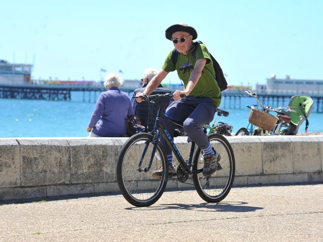 Enjoying the heatwave on Worthing beach. Pic S Robards SR2206152