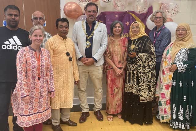 The Mayor of Chichester, Councillor Julian Joy, with the people behind the Eid event, including Shalufa Begum from Connecting Cultures, Shobuz Ahmad from the Jamia Centre and the team at Voluntary Action Arun and Chichester.