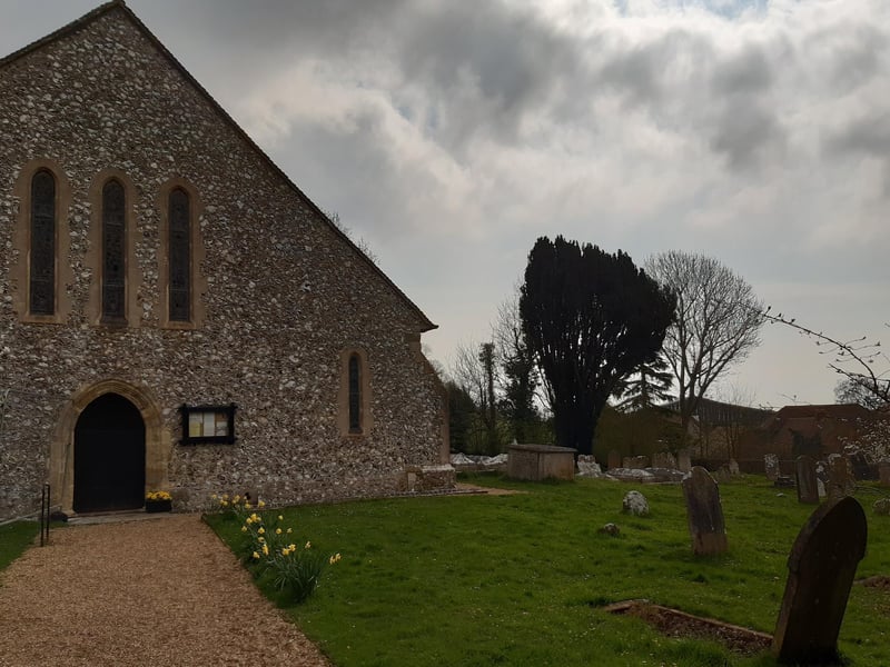 Walk around the church to the back.