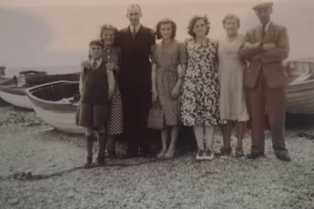 Bob Spanswick, who grew up to be a longshore fisherman, with his family on Worthing seafront