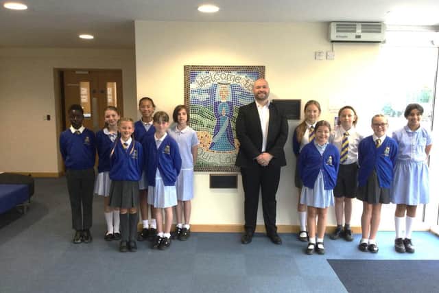 Peter Lamb with children from OLQOH