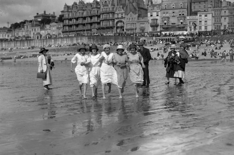 Factory workers from Ticklers' jam factory, having fun on the beach at Hastings.