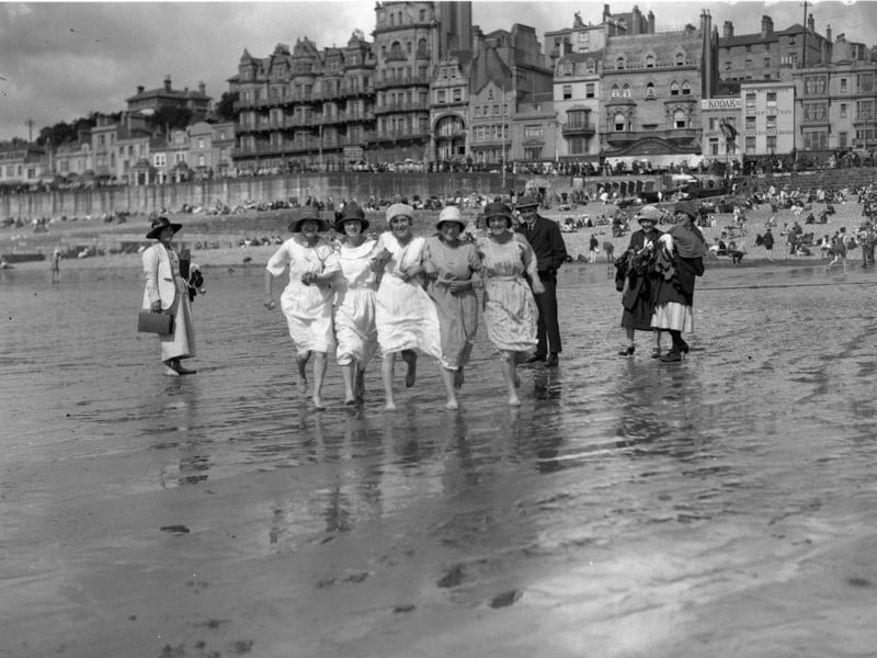 Factory workers from Ticklers' jam factory, having fun on the beach at Hastings.