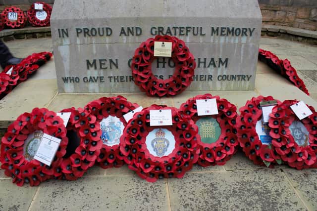 A respectful act of remembrance will be marked this year at the War Memorial in Horsham’s Carfax on Remembrance Sunday. Picture courtesy of Horsham District Council
