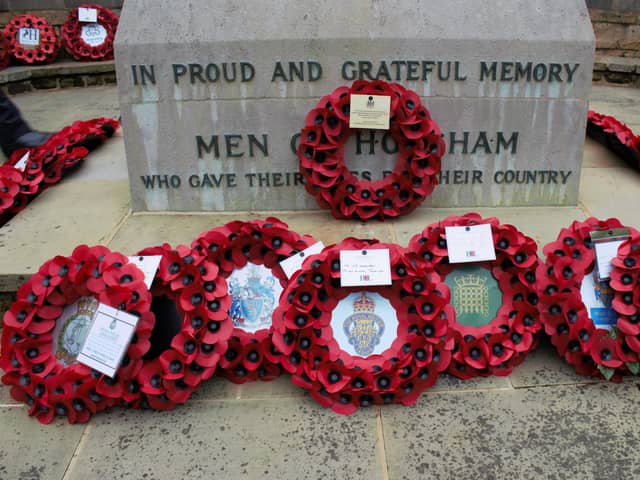 A respectful act of remembrance will be marked this year at the War Memorial in Horsham’s Carfax on Remembrance Sunday. Picture courtesy of Horsham District Council