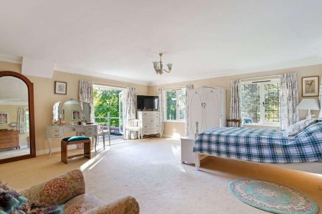 There are five bedrooms on the first floor, including an excellent principal suite comprising a generous bedroom with lovely views, French doors opening to a large roof top balcony, and an en suite bathroom