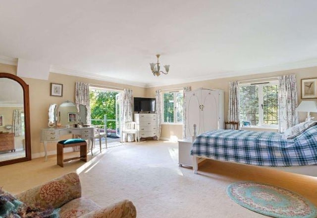 There are five bedrooms on the first floor, including an excellent principal suite comprising a generous bedroom with lovely views, French doors opening to a large roof top balcony, and an en suite bathroom