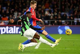 Danny Welbeck of Brighton & Hove Albion shoots whilst under pressure from Joachim Andersen of Crystal Palace