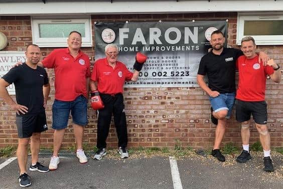Crawley Amateur Boxing Club coaches and chairman with Gary Bailey of Faron Homes. Picture: Rees Hopcraft