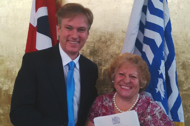 Henry Smith MP congratulated Crawley charity campaigner Maria Hains at a ceremony officially granting her British citizenship.