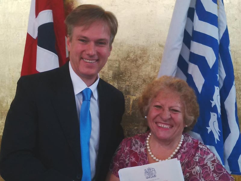 Henry Smith MP congratulated Crawley charity campaigner Maria Hains at a ceremony officially granting her British citizenship.
