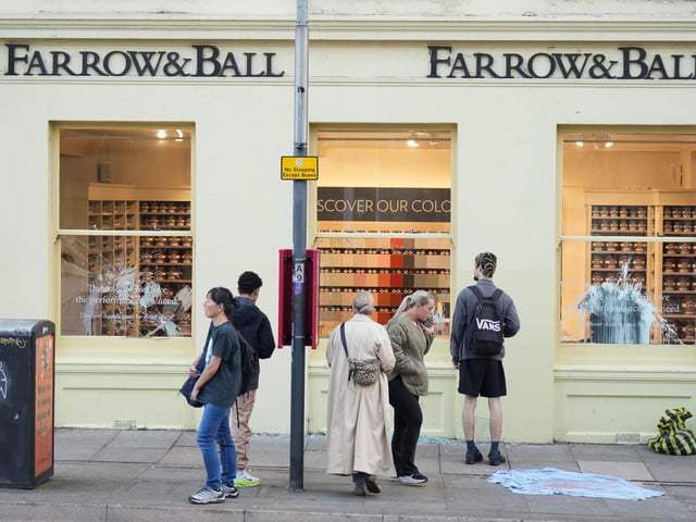 Police officers arrived in their numbers at the Farrow & Ball paint shop, in Western Road, on Wednesday afternoon (October 8).