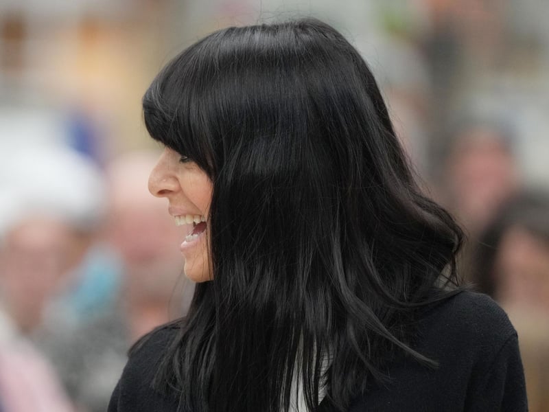 Claudia Winkleman has been pictured at Brighton railway station as her search continues to find more of the UK's most exciting amateur pianists.