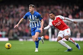 Evan Ferguson of Brighton & Hove Albion battles for possession with Gabriel of Arsenal