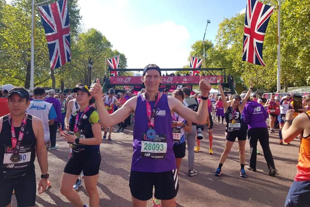 Henk Barnard, 45, from East Grinstead, at the finish line of the London Marathon