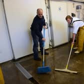 Cleaning up at Aglaia Seafoods after flooding at Riverside Industrial Estate Littlehampton, on Friday, December 6, 2013