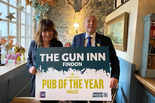 Arundel & South Downs MP Andrew Griffith at The Gun Inn in Findon to congratulate landlady Sally Harris on being nominated in the Great British Pub Awards.