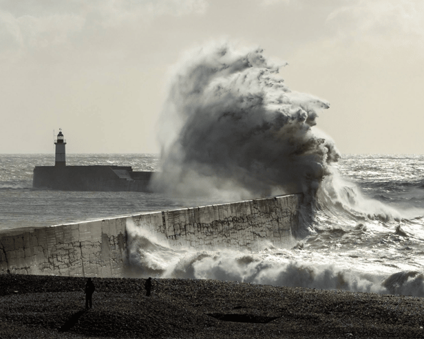 Storm Austen hits Newhaven beach with 14-metre waves.
