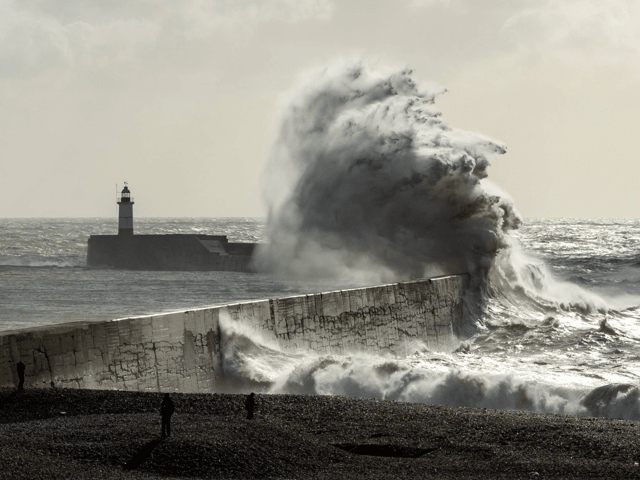 Storm Austen hits Eastbourne beach with 14-metre waves.