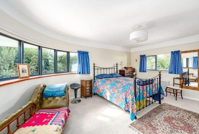 The large principle bedroom benefits from an en-suite bathroom.