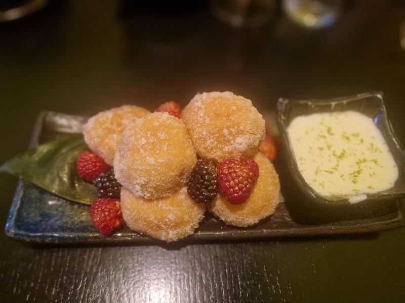 Warm passion fruit and coconut doughnuts with a yoghurt dipping sauce at The Ivy Asia, Brighton