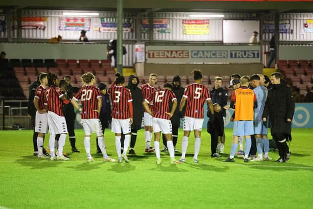 Lewes players and staff after their penalty shootout defeat to Bognor in the FA Trophy | Picture: James Boyes