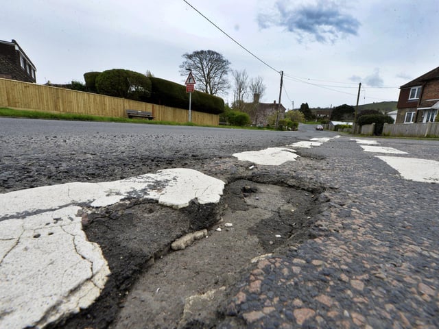 Potholes in Jevington Road, Polegate (Photo by Jon Rigby)