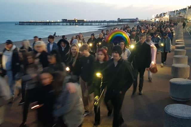People pay their respects to Jason Pulman along Hastings seafront