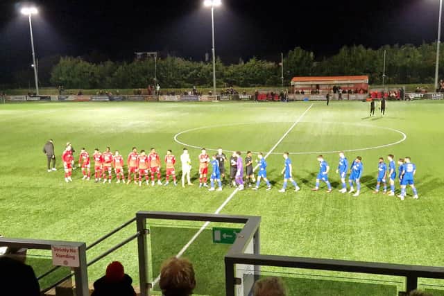 Crawley Town and Worthign players before the game. Picture: SussexWorld