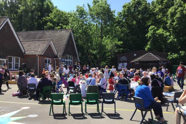 The garden party was attended by many people in Stedham.