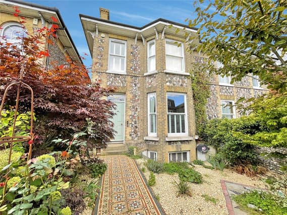 This six-bedroom, semi-detached home is packed with character. It is on the market with Michael Jones and Company with a guide price of £650,000.
