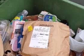 Amazon package is delivered to waste bin