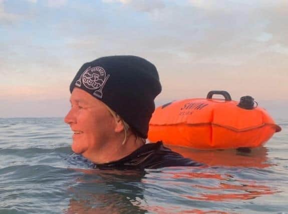 Hope Louise in the sea during her Swim Challenge in August. Picture: BrainTumourResearch