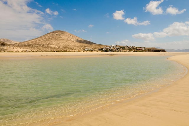 Lcated on the Canary Island of Fuerteventura, Sotavento Beach rated highly for being a "peaceful and secluded beach spot".
