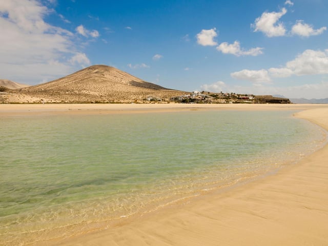 Lcated on the Canary Island of Fuerteventura, Sotavento Beach rated highly for being a "peaceful and secluded beach spot".