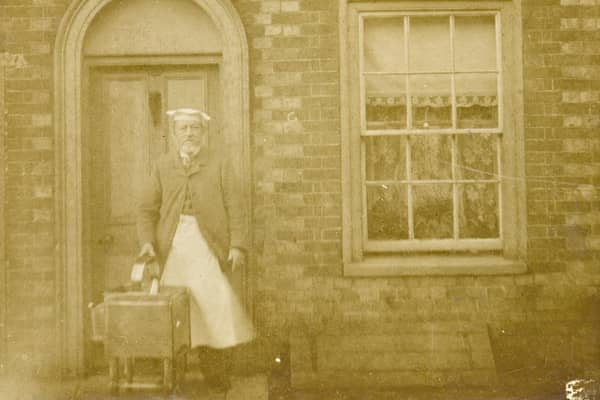 Joe Faro standing outside his house in Somerstown with his pie oven. Picture: The Novium Museum.
